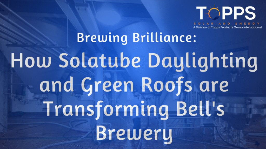 Interior view of Bell’s Brewery with stainless steel tanks under bright Solatube daylighting, featuring Solatube and Bell’s Brewery logos, illustrating sustainable brewing practices.